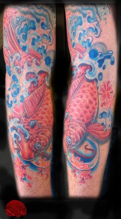 Phil Robertson - Koi fish tattoo with cherry blossoms.